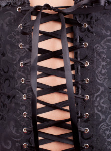 Waist training corsets tied and fitted